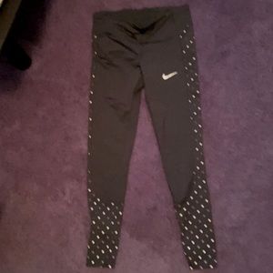 Nike Dri-Fit running tights. W Med Never Worm